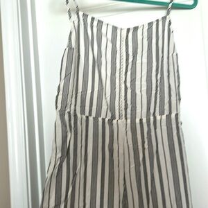 Roxy jumper w/ open back and lace detail at front.